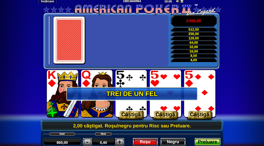 Ecranul de joc pentru American Poker II cu o mână câștigătoare de trei de un fel și jocul adițional Gamble pentru risc sau preluare.